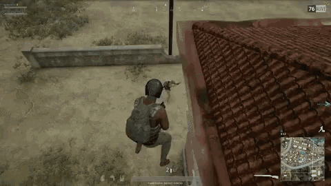 a person is playing a video game on a roof .