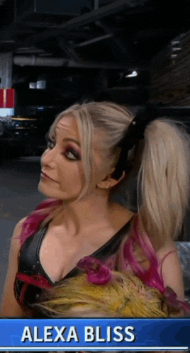 a woman named alexa bliss with a ponytail