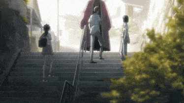 a man in a red robe stands on a set of stairs