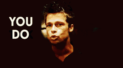 a man in a black shirt is holding a can of fight club