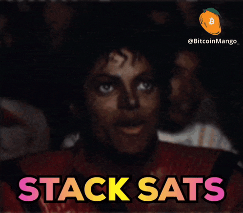 a man covering his mouth with his hands and the words stack sats