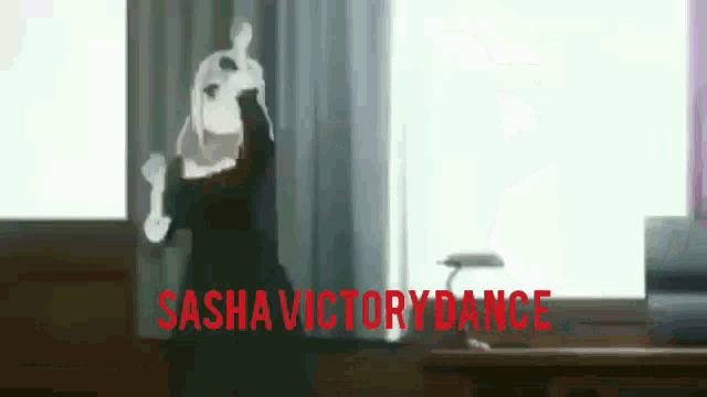 a person is standing in front of a window with the words sasha victory dance written on the bottom .