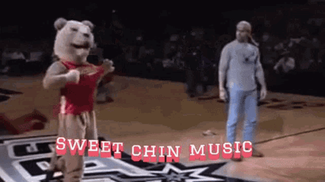 a mascot on a basketball court with the words sweet chin music below it