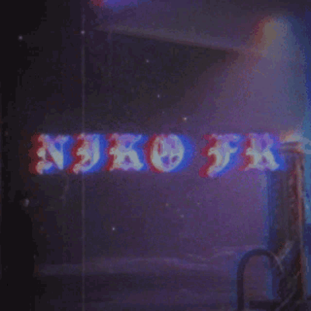 a neon sign that says niko fr is lit up