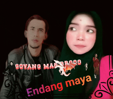 a man and a woman are standing next to each other and the woman is wearing a green hijab