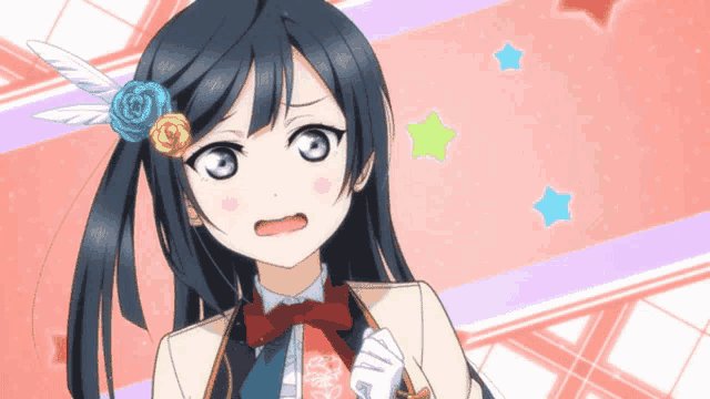 a girl with a feather in her hair is making a funny face