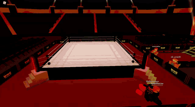 an empty wrestling ring with a few wrestlers in it and a dead sign