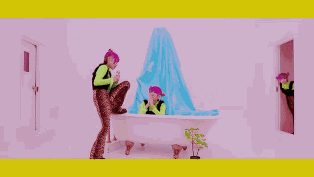 a woman with purple hair is standing next to a bathtub