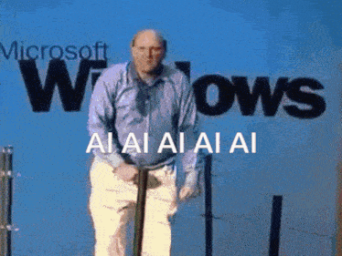 a bald man in a blue shirt is clapping his hands and the words ai ai ai ai are visible