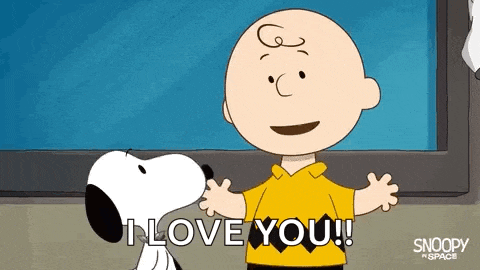 charlie brown and snoopy are hugging each other and saying i love you .