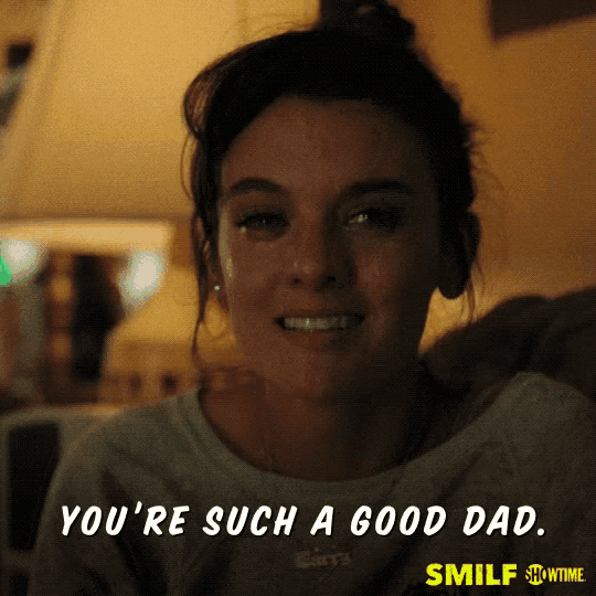 a woman is smiling with the words you 're such a good dad on the bottom