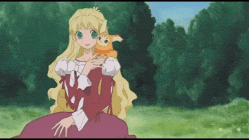 a girl in a red dress is sitting in a field with a dog on her shoulder