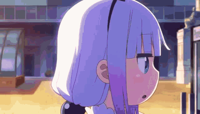a close up of a purple haired anime girl with a headband .