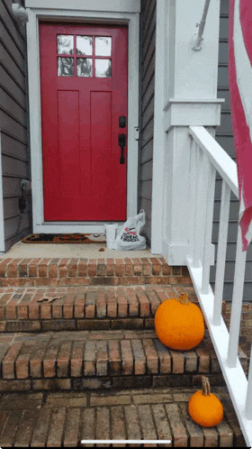 the front door of a house has a bag that says pizza hut