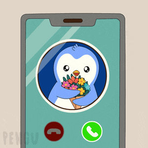 a penguin is holding a bouquet of flowers on a cell phone