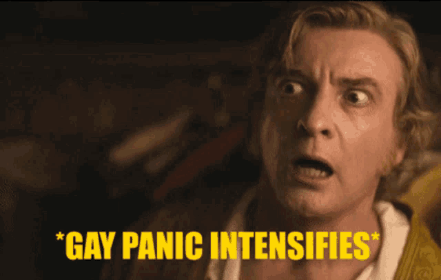 a close up of a man 's face with the words " gay panic intensifies " above him