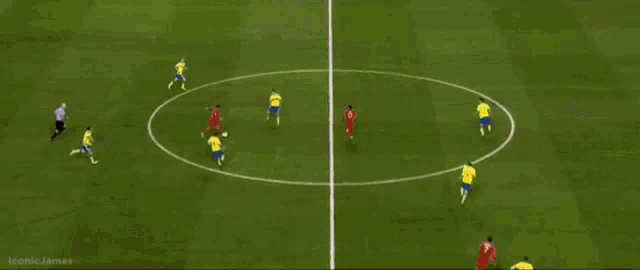 soccer players on a field with oddset advertisements on the side