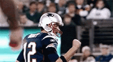 a football player wearing a jersey with the number 12