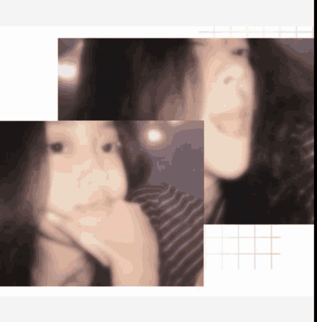 a blurry picture of a woman with her hand on her face