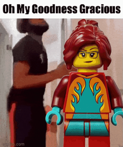 a lego girl with red hair is standing in front of a man with a beard ..