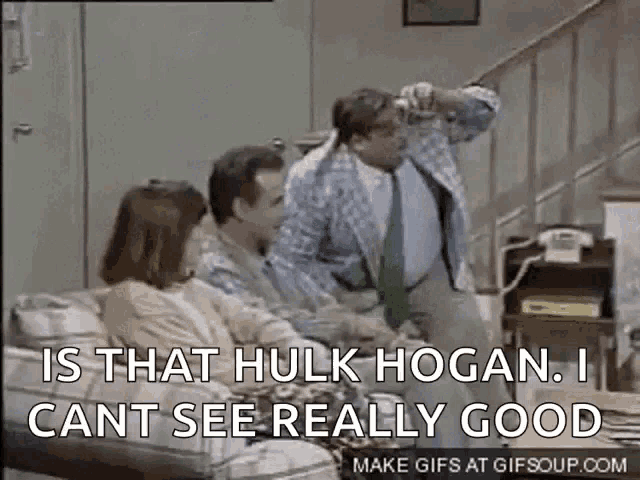 a group of people are sitting on a couch and one of them is talking about hulk hogan