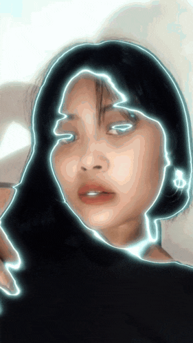 a close up of a woman 's face with a blue outline around her face
