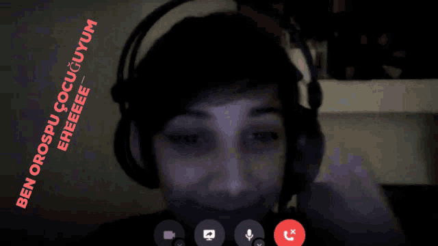 a man wearing headphones is talking on a video call with a purple and green background that says ' purple '