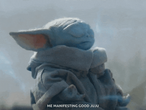 a baby yoda with the words me manifesting good juju on the bottom right