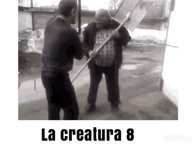 a man holding a shovel next to another man with the words la creatura 8 on the bottom
