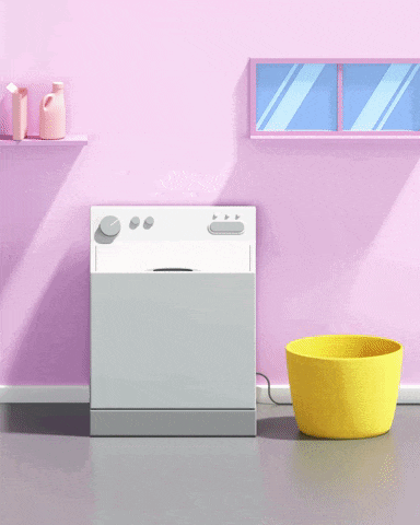 clothes are falling out of a washer and dryer