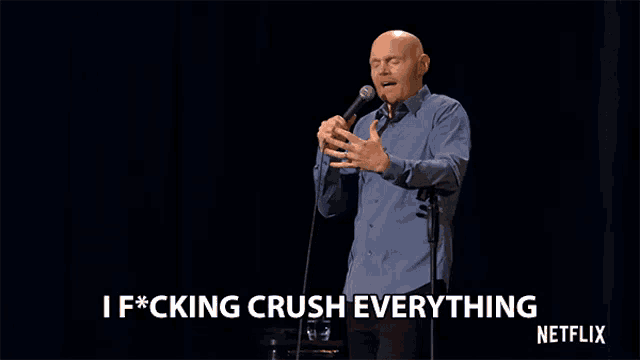 a man stands in front of a microphone and says i f * cking crush everything netflix