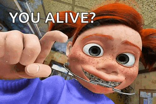 a cartoon girl with braces on her teeth is pointing at the camera with the words " you alive " above her head