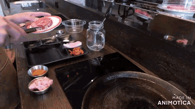 a video of a person preparing food with the words made in animatica on the bottom