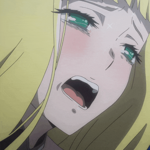 a blonde anime girl with green eyes is crying