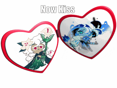 two heart shaped mirrors with the words now kiss on the top
