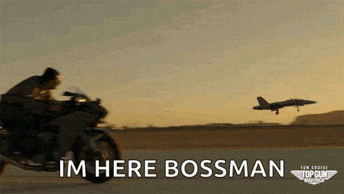 a man riding a motorcycle with the words " im here bossman " written on the bottom