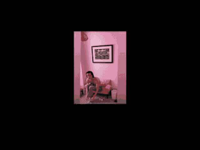 a picture of a woman sitting on a pink chair with the words pretty in pink below her