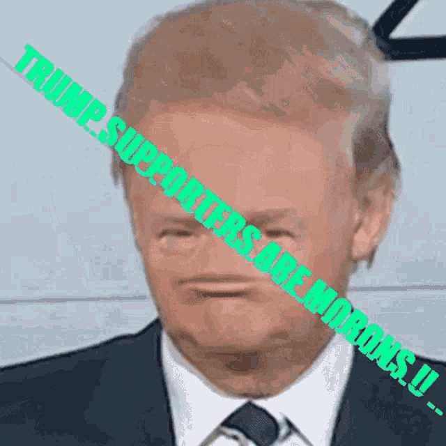 a close up of donald trump 's face with the words " trump supporters are morons " behind him