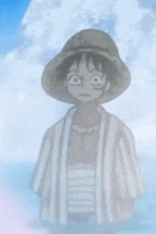 a blurred picture of a person wearing a hat and a striped shirt .