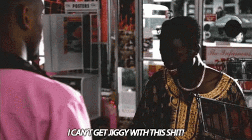 a woman in a pink shirt is talking to a man in a pink shirt and says i cant get jiggy with this shit .