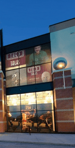 the outside of a building with a sign that says " talk " on it