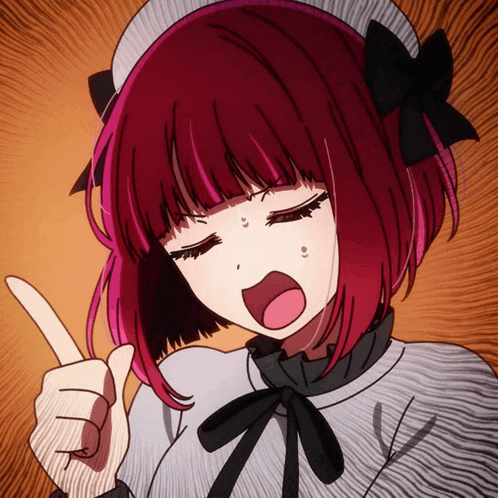 a girl with red hair is making a funny face and pointing her finger