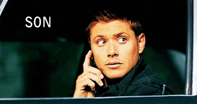 a man is talking on a cell phone and the word son is on the bottom right