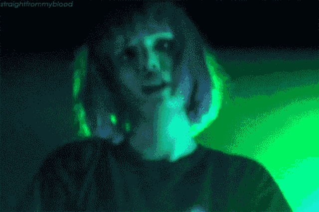 a blurry picture of a person with the words straightfrommyblood written on the bottom
