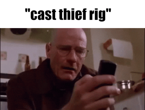 a bald man with glasses is looking at a cell phone with the words " cast thief rig " above him .