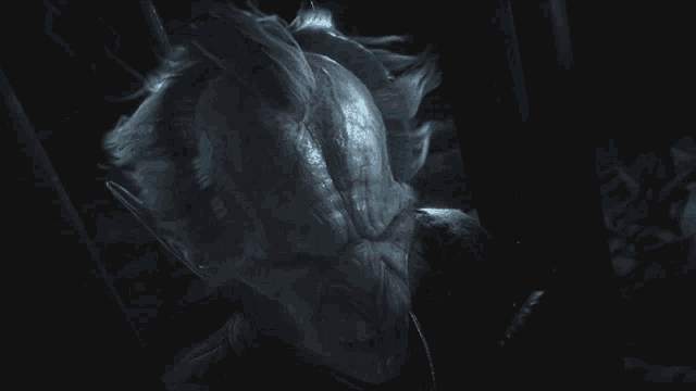 a close up of a monster 's face with a very large mouth
