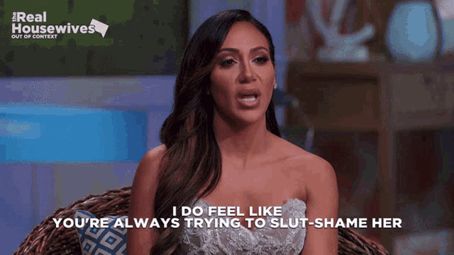 a woman sitting in a chair with the words " i do feel like you 're always trying to slut shame her "