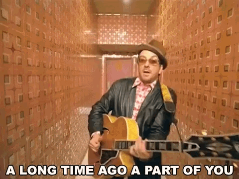 A Long Time Ago A Part Of You Singing GIF - A Long Time Ago A Part Of You Singing Strumming GIFs