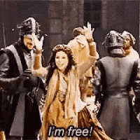 a group of people are standing next to each other and one of them is saying `` i 'm free ! ''
