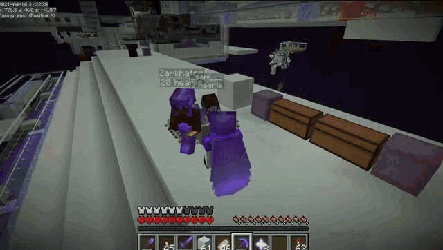 a screenshot of a minecraft game shows a player named zankha standing next to another player